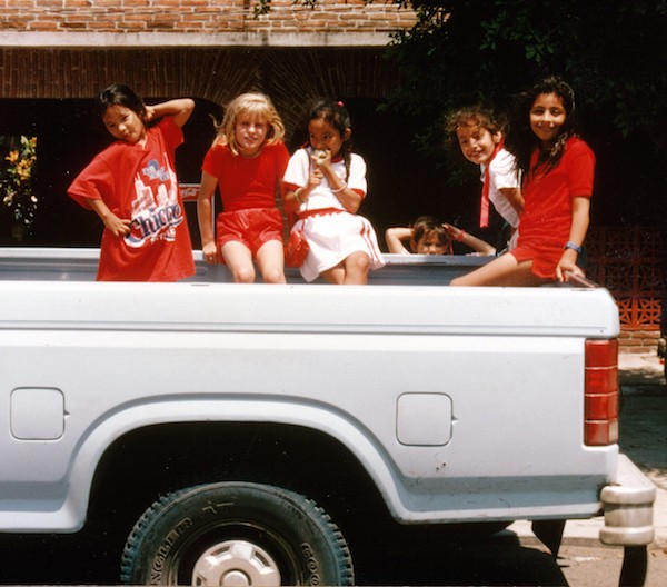 The author's daughter Heather and her neighborhood pals heading to day camp in the author's truck.