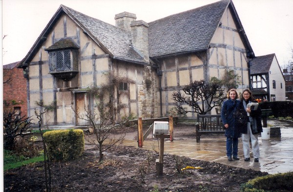 On a typically rainy English day, the author (at right) visits Shakepeare’s house in Stratford-Upon-Avon.