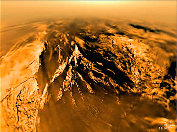 The Huygens probe captured this image of Titan's landscape as it descended through the moon's atmosphere.