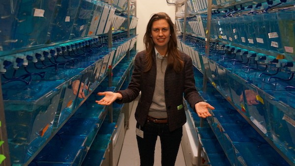 Olivia Osborne stands in the UCLA basement that houses the thousands of zebrafish she studies.