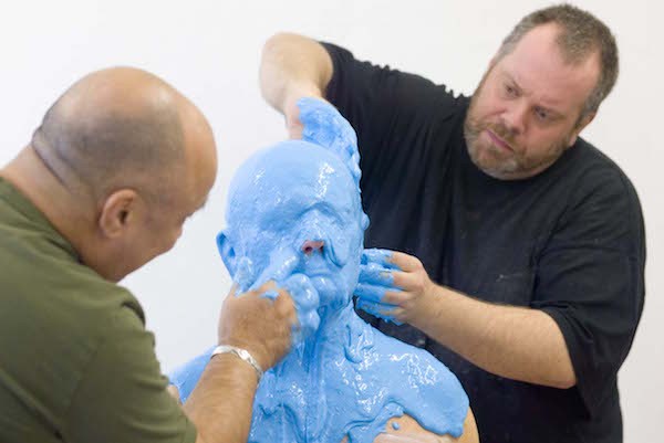 The making of Lewis' cast head. 