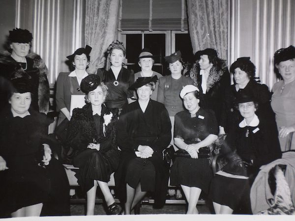 Eleanor Roosevelt, center, acting as assistant director of civilian defense, at a 1941 conference on “women’s activities in civilian defense.” 