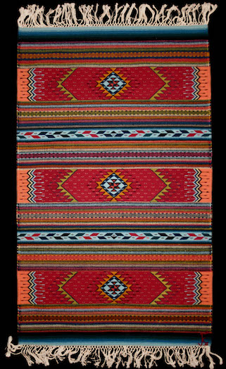 Traditional tapate—belonging to the author—that was woven by Fidel Cruz Lazo of Teotitlán del Valle, who colors his yarns with only cochineal and other local natural dyes. Courtesy of Amy Butler Greenfield.