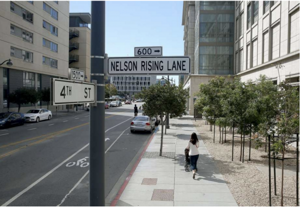 View of Nelson Rising Lane street sign at 4th Street in San Francisco. Photo by Liz Hafalia/The San Francisco Chronicle. 
