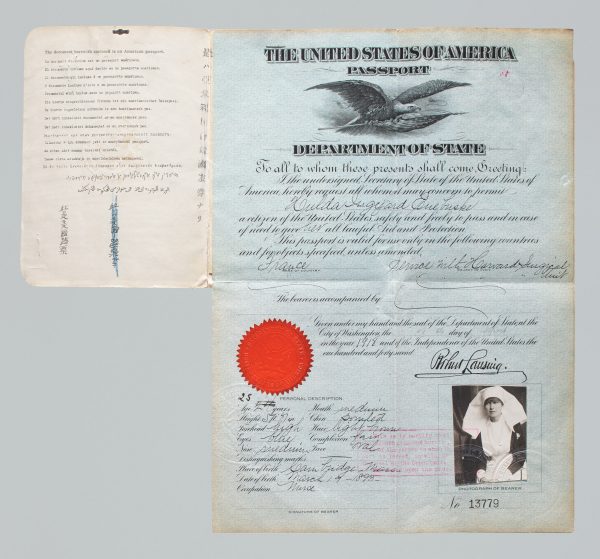 Passport issued to WWI nurse Hulda Euebuske, who appears in her uniform for her passport photo. 1918. Courtesy of State Department, U.S. Diplomacy Center.