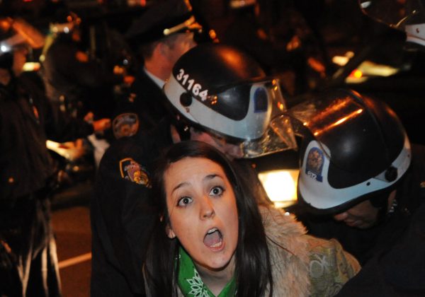 An Occupy Wall Street protester is arrested by police in New York City, Jan. 1, 2012. Photo by Stephanie Keith/Associated Press.