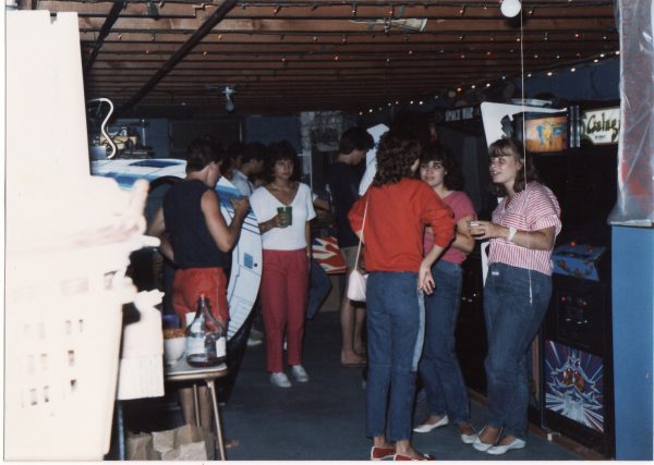 Teens partying in a family basement with video games in 1985. Photo courtesy of Richie Wiebke. 