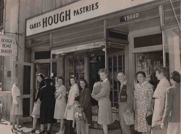 Customers form a line outside of a Hough Bakery in 1945.