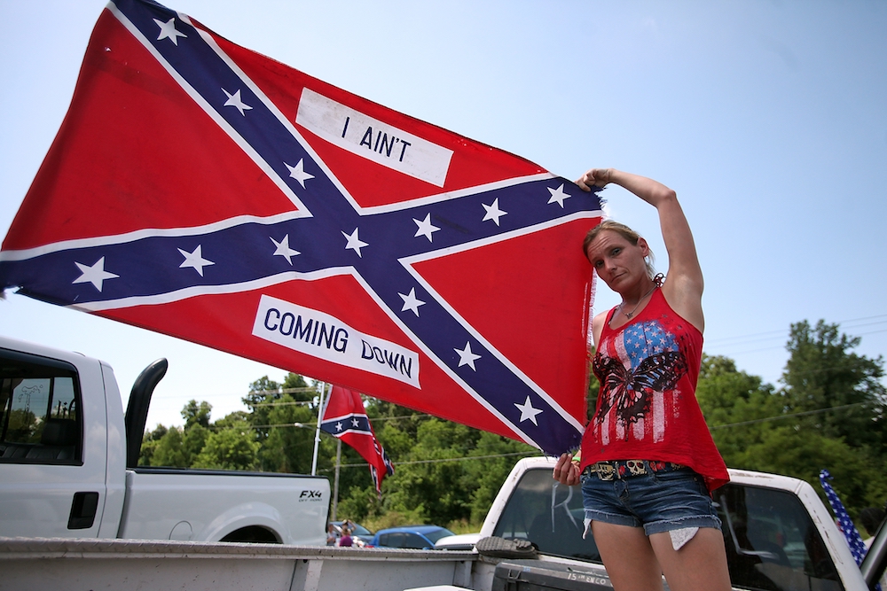 Before a 2015 Confederate flag rally in Vicksburg, Mississippi, a woman sho...