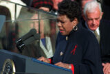 Maya Angelou recites her poem "On the Pulse of the Morning," written for the inaugural, during the presidential inauguration on Capitol Hill in Washington, D.C., Jan. 20, 1993. She wears a black coat and is looking down at the podium.