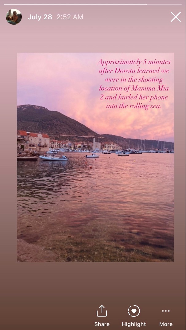 A screenshot of an Instagram Story with a picture of a port during a pink sunset. Italicized text hovers on top right of the photo and says: "Approximately 5 minutes after Dorota learned we were in the shooting location of Mama Mia 2 and hurled her phone into the rollng sea."