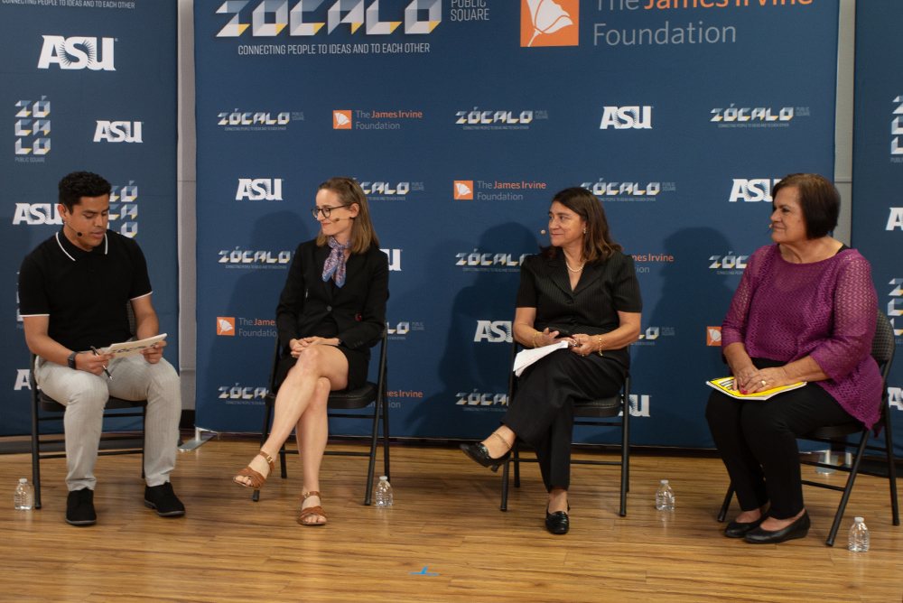 Four panelists sitting in front of a blue backdrop that has the logos of Zócalo Public Square and The James Irvine Foundation on it. The panelists are, from left to right: Cresencio Rodriguez-Delgado, Janette Dill, Helda Pinzón-Perez, and Martha Valladarez.